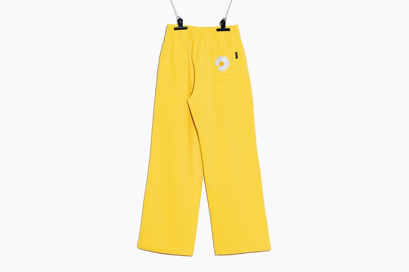 peaceminusone g dragon varsity jacket sweatpants flower towel daisy brooch epoxy sticker release info