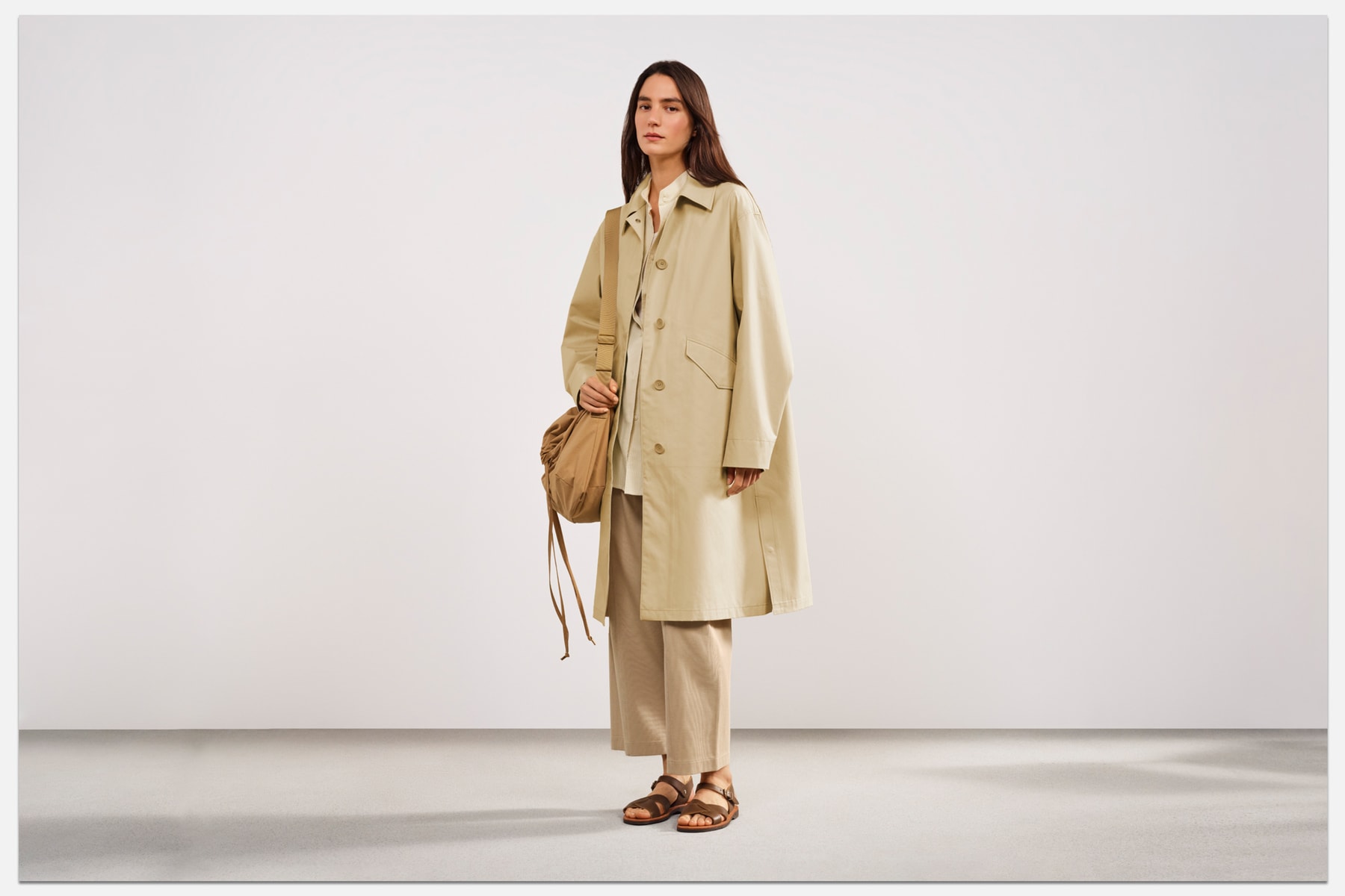 UNIQLO Releases Essentials Lineup Wardrobe Staples Minimalist Neutral T-Shirts Crew Necks Silhouettes Fundamental Cotton Pieces Spring Summer 2022 Collection Shirt Dresses Trench Coat Button-Ups Windbreaker Parisian Style