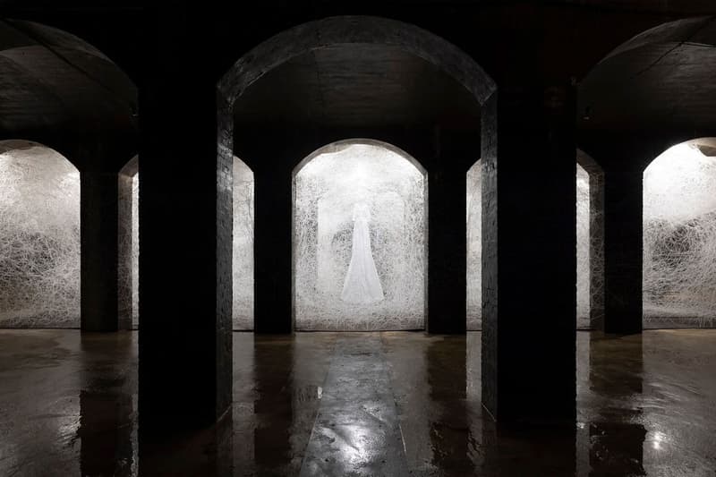 Chiharu Shiota copenhagen former water reservoir exhibition cisternerne frederiksberg museums 1000 sqm multiple realities labyrinth caverns water dresses weave thread news