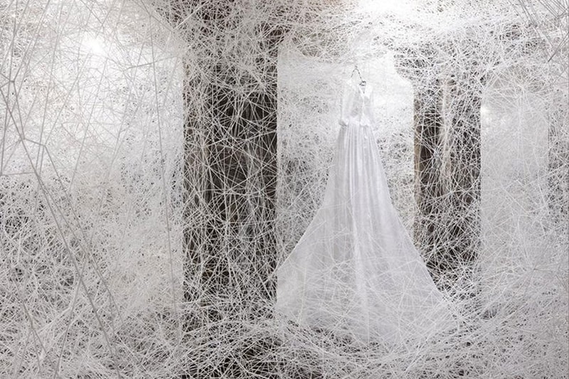 Chiharu Shiota copenhagen former water reservoir exhibition cisternerne frederiksberg museums 1000 sqm multiple realities labyrinth caverns water dresses weave thread news