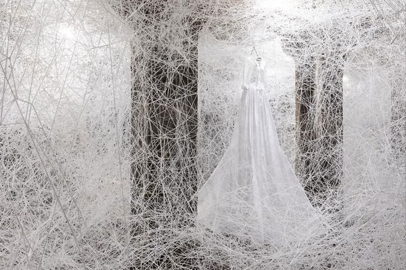 Chiharu Shiota copenhagen former water reservoir exhibition cisternerne frederiksberg museums 1000 sqm multiple realities labyrinth caverns water dresses weave thread news