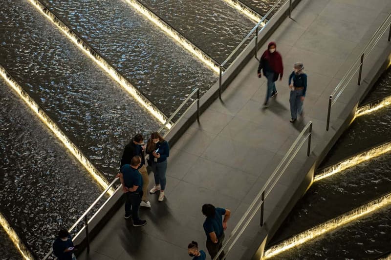 Apple maryah island store abu dhabi opening waterfront promenade foster partners securities exchange building stepped pyramid waterfall news