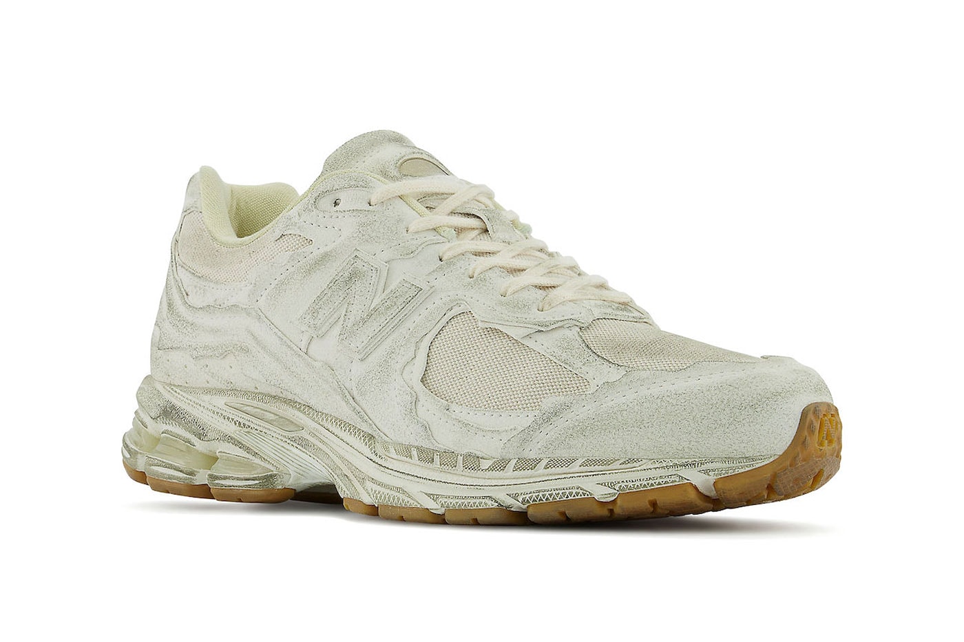New Balance Expands Its 2002R "Protection Pack" With a Worn Aesthetic for SS22 new balance 2002R M2002RDG constructed with abzorb midsole N-ergy outsole deconstructed white aged