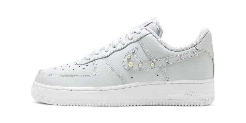 white and black tick air force 1