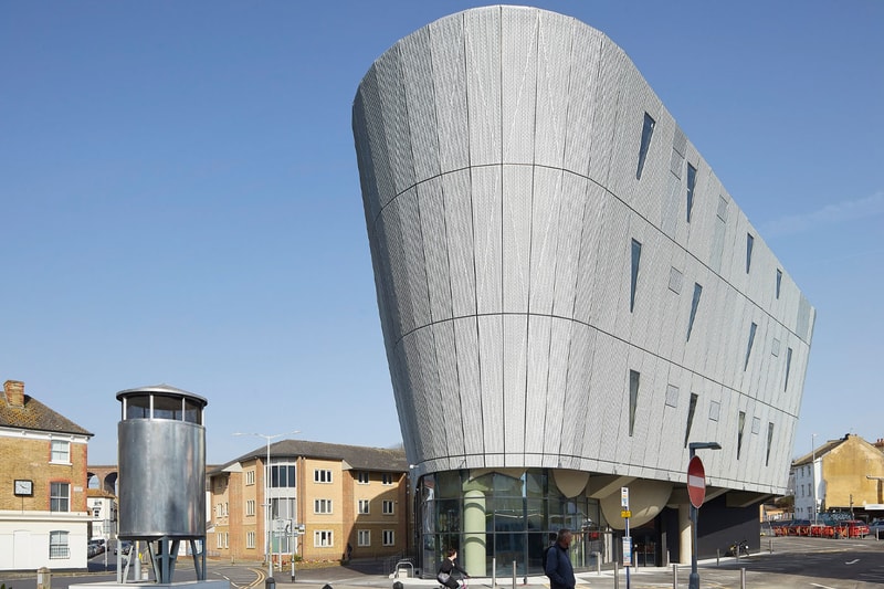 Hollaway Studio Designs the World's First Multi Floor Skatepark climbing wall three stories adrenaline building boxing gym cafe space central hub for youth 