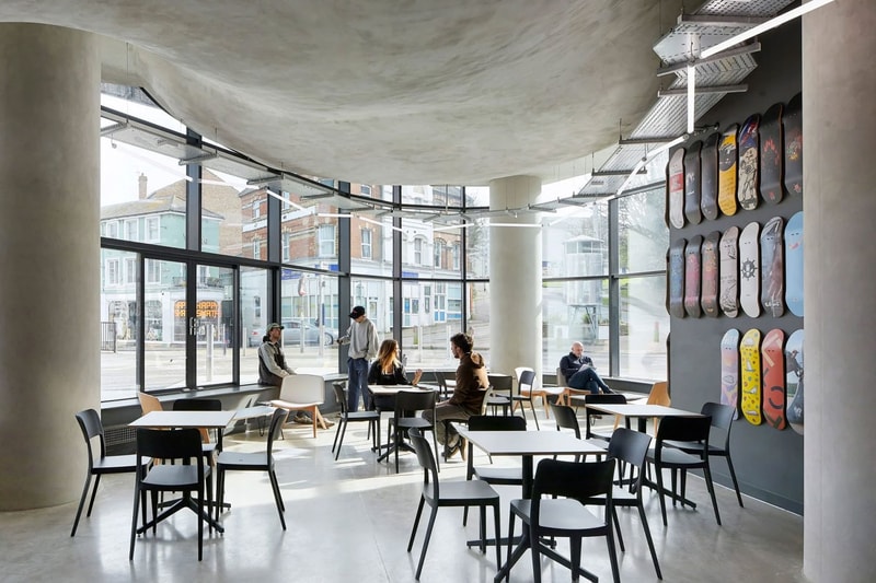 Hollaway Studio Designs the World's First Multi Floor Skatepark climbing wall three stories adrenaline building boxing gym cafe space central hub for youth 