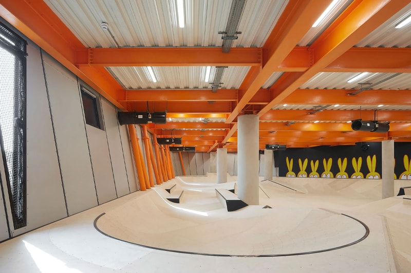 Hollaway Studio Designs the World's First Multi Floor Skatepark climbing wall three stories adrenaline building boxing gym cafe space central hub for youth 