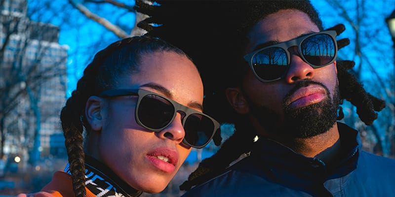 nike sunglasses on face