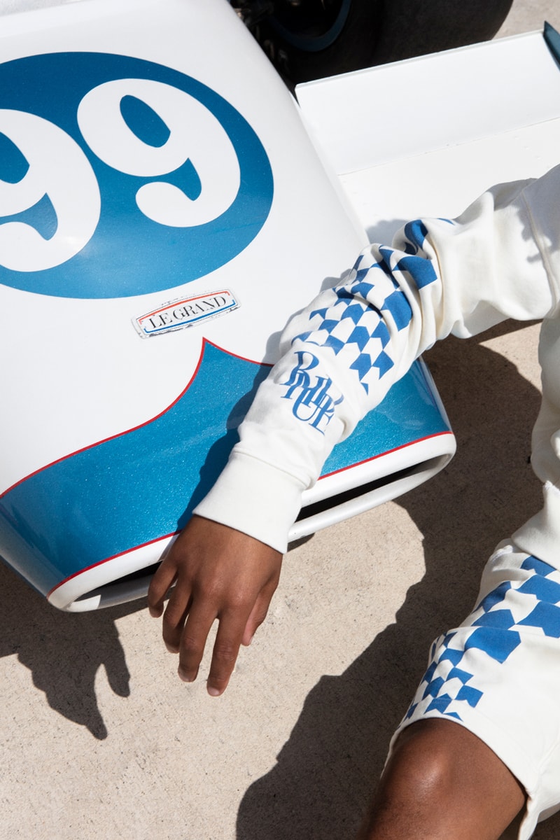 Rhude x The Webster Capsule Miami Grand Prix Formula 1 Tamiya Motor Car Toys South Beach Rhugi Villaseñor Jackets T-Shirts Hoodies Swim Trunks Hat Graphic Embroidery Check Motif Checker Skyline Beachside Themes Blue White Rhude Racing Hat Grand Prix Varsity Jacket Ribbed Cuff Hem Front Back Panels Cobalt 11-Piece Capsule Vibrant Hues Racing Legacy Circuit