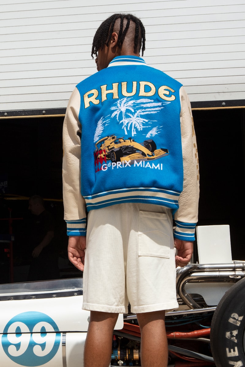 Rhude x The Webster Capsule Miami Grand Prix Formula 1 Tamiya Motor Car Toys South Beach Rhugi Villaseñor Jackets T-Shirts Hoodies Swim Trunks Hat Graphic Embroidery Check Motif Checker Skyline Beachside Themes Blue White Rhude Racing Hat Grand Prix Varsity Jacket Ribbed Cuff Hem Front Back Panels Cobalt 11-Piece Capsule Vibrant Hues Racing Legacy Circuit