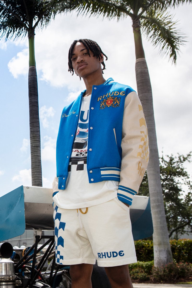 Rhude x The Webster Capsule Miami Grand Prix Formula 1 Tamiya Motor Car Toys South Beach Rhugi Villaseñor Jackets T-Shirts Hoodies Swim Trunks Hat Graphic Embroidery Check Motif Checker Skyline Beachside Themes Blue White Rhude Racing Hat Grand Prix Varsity Jacket Ribbed Cuff Hem Front Back Panels Cobalt 11-Piece Capsule Vibrant Hues Racing Legacy Circuit