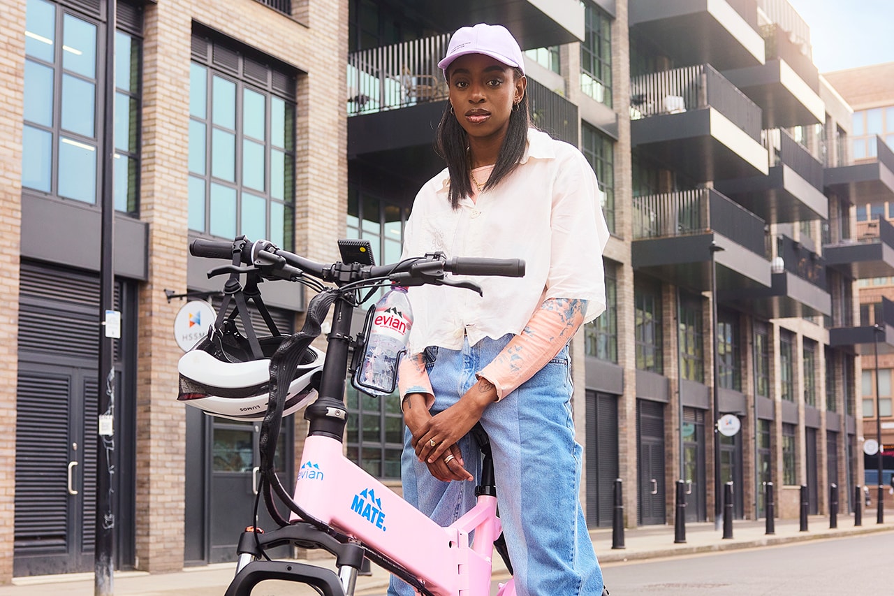 evian mate cat burns singer e-bike bicycle sustainability video music commute inspiration