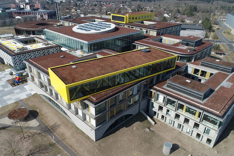 LEGO New Campus headquarters Inside Look Denmark CF Moller Architects size workplace people house fitness center workshop homestay cinema park activity zone kitchen health clinic sustainable LEED certification news 