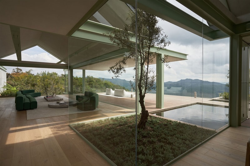 J Balvin Shows off His Mountainous Medellín Villa Cinco Sólidos Casa Aire reggaeton architecture contemporary mansion vista Takashi Murakami friendswithyou subtle japanese zen reggaeton