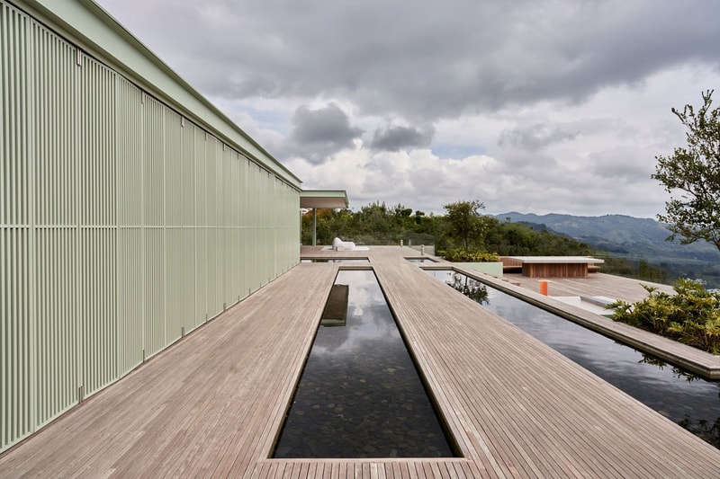 J Balvin Shows off His Mountainous Medellín Villa Cinco Sólidos Casa Aire reggaeton architecture contemporary mansion vista Takashi Murakami friendswithyou subtle japanese zen reggaeton