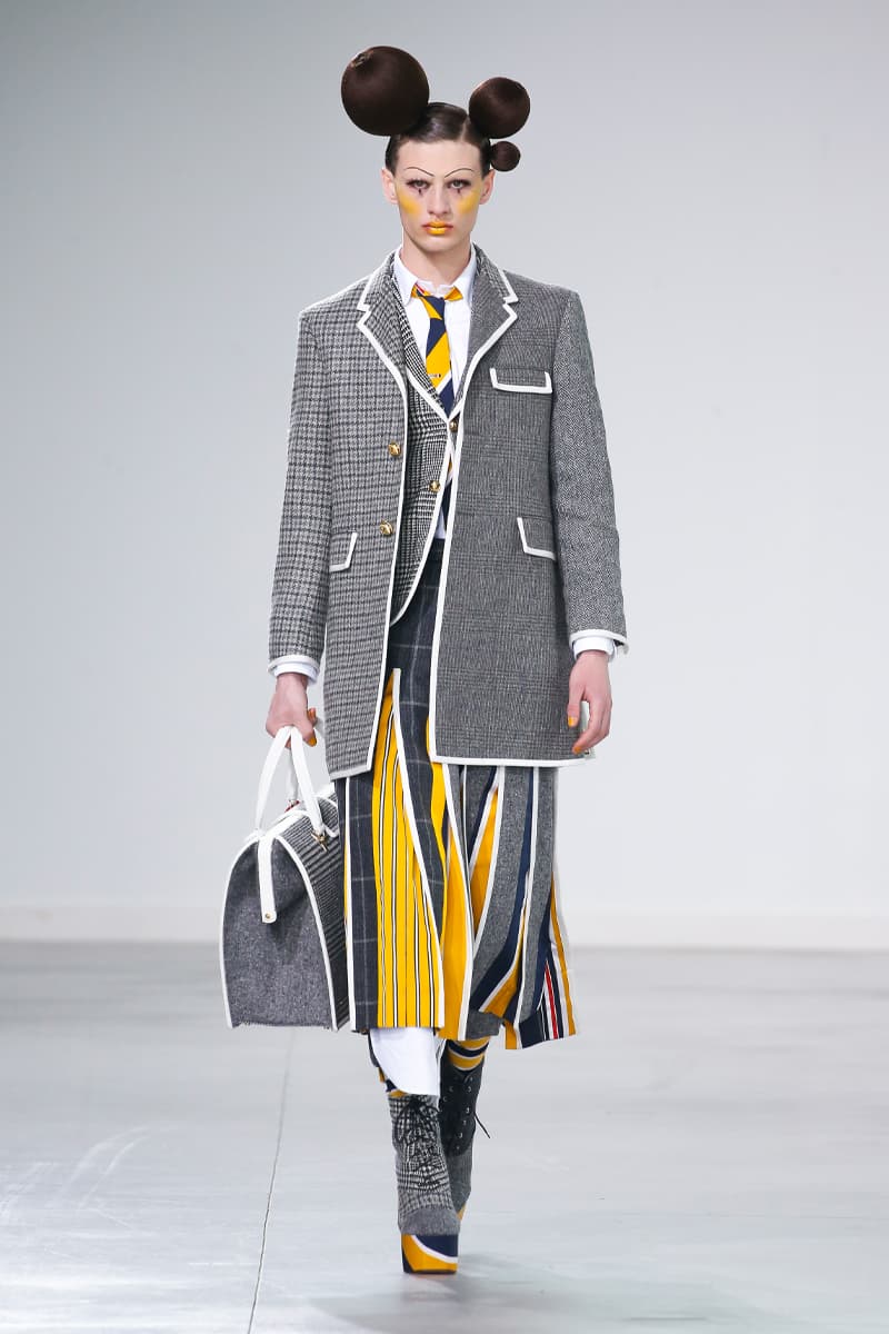 Thom Browne Brings the Drama to Classic Tailoring for Fall 2022 nyc new york city pleated skirts blazers toys chairbear adult toy shop teddybears 