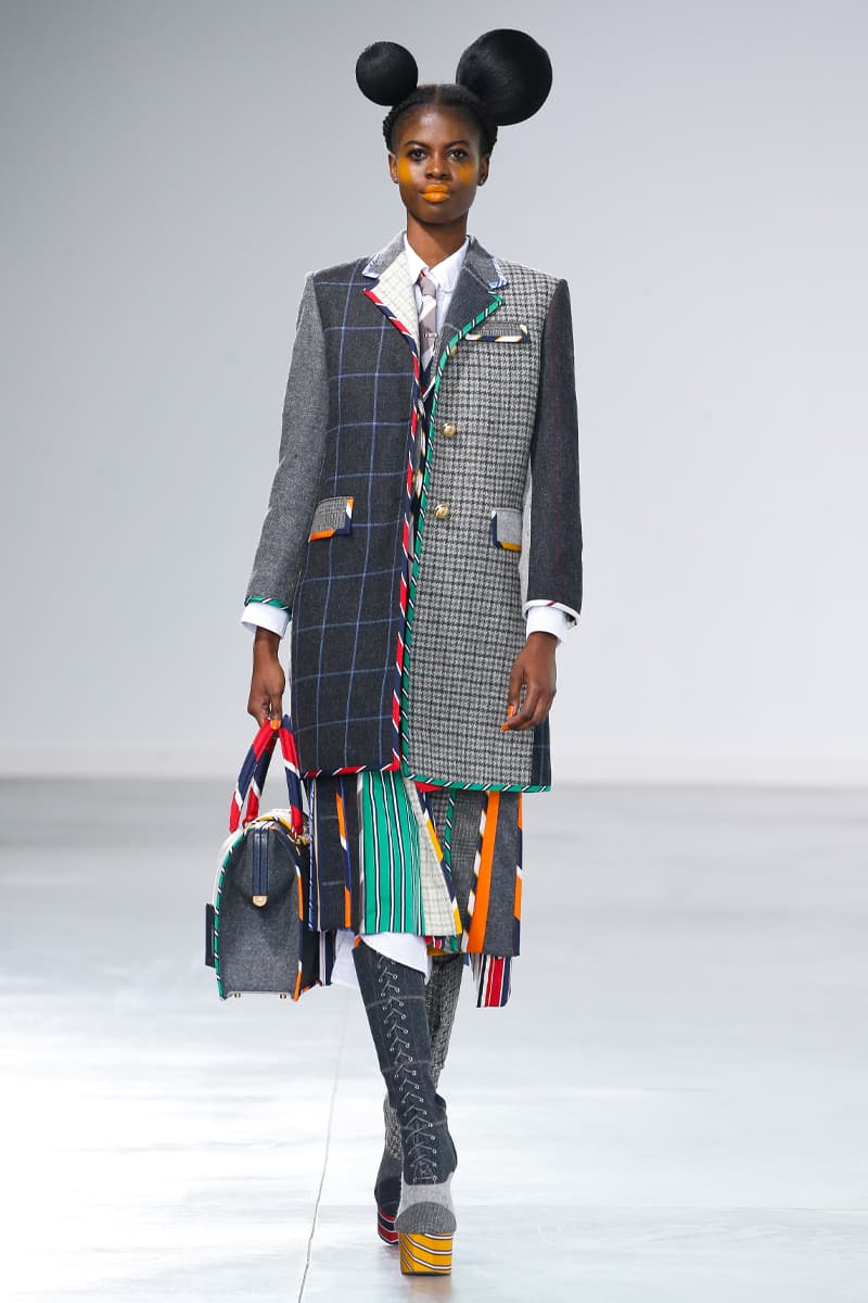 Thom Browne Brings the Drama to Classic Tailoring for Fall 2022 nyc new york city pleated skirts blazers toys chairbear adult toy shop teddybears 