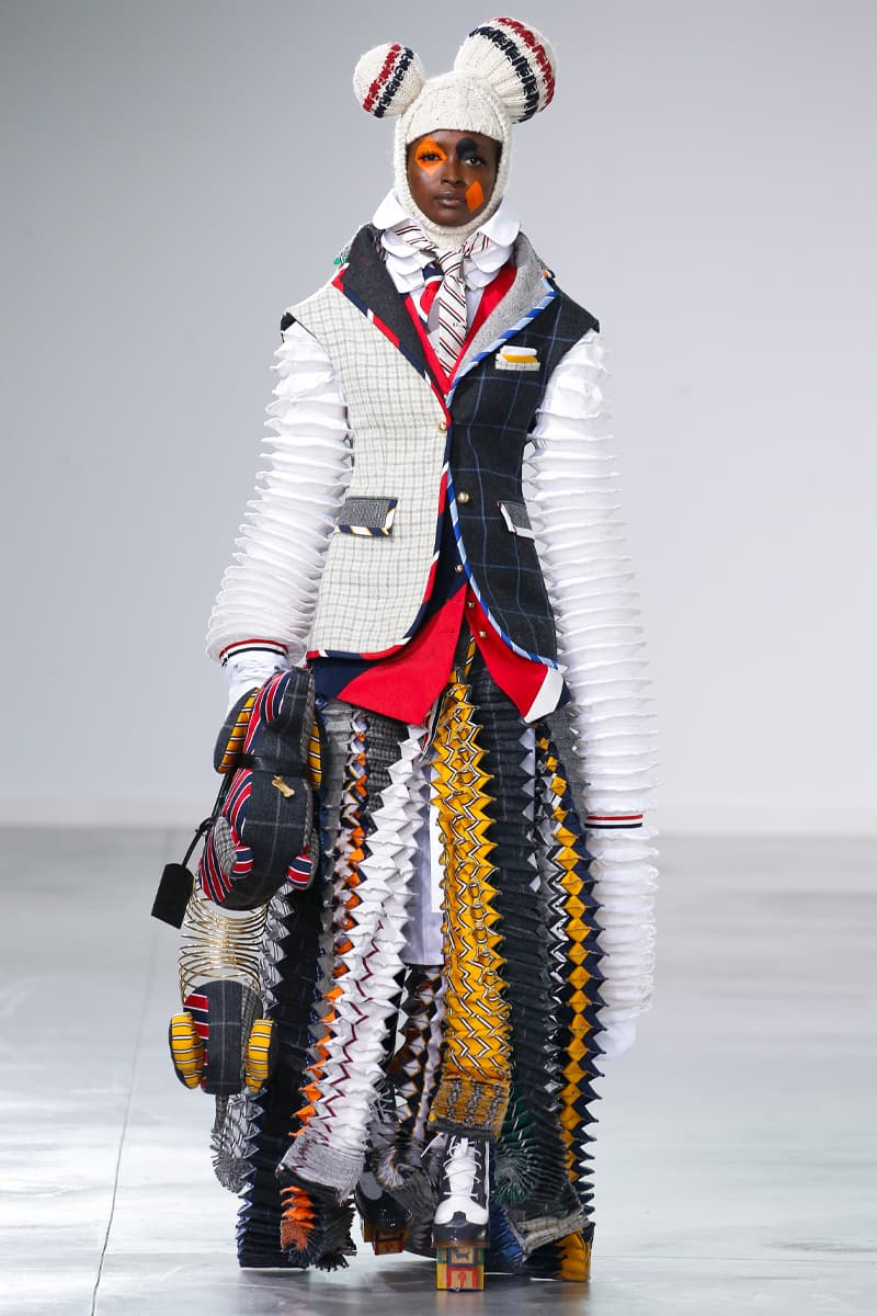 Thom Browne Brings the Drama to Classic Tailoring for Fall 2022 nyc new york city pleated skirts blazers toys chairbear adult toy shop teddybears 