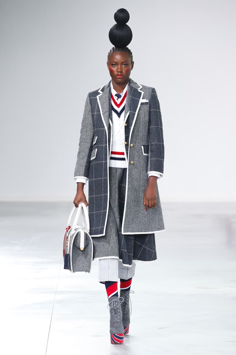 Thom Browne Brings the Drama to Classic Tailoring for Fall 2022 nyc new york city pleated skirts blazers toys chairbear adult toy shop teddybears 