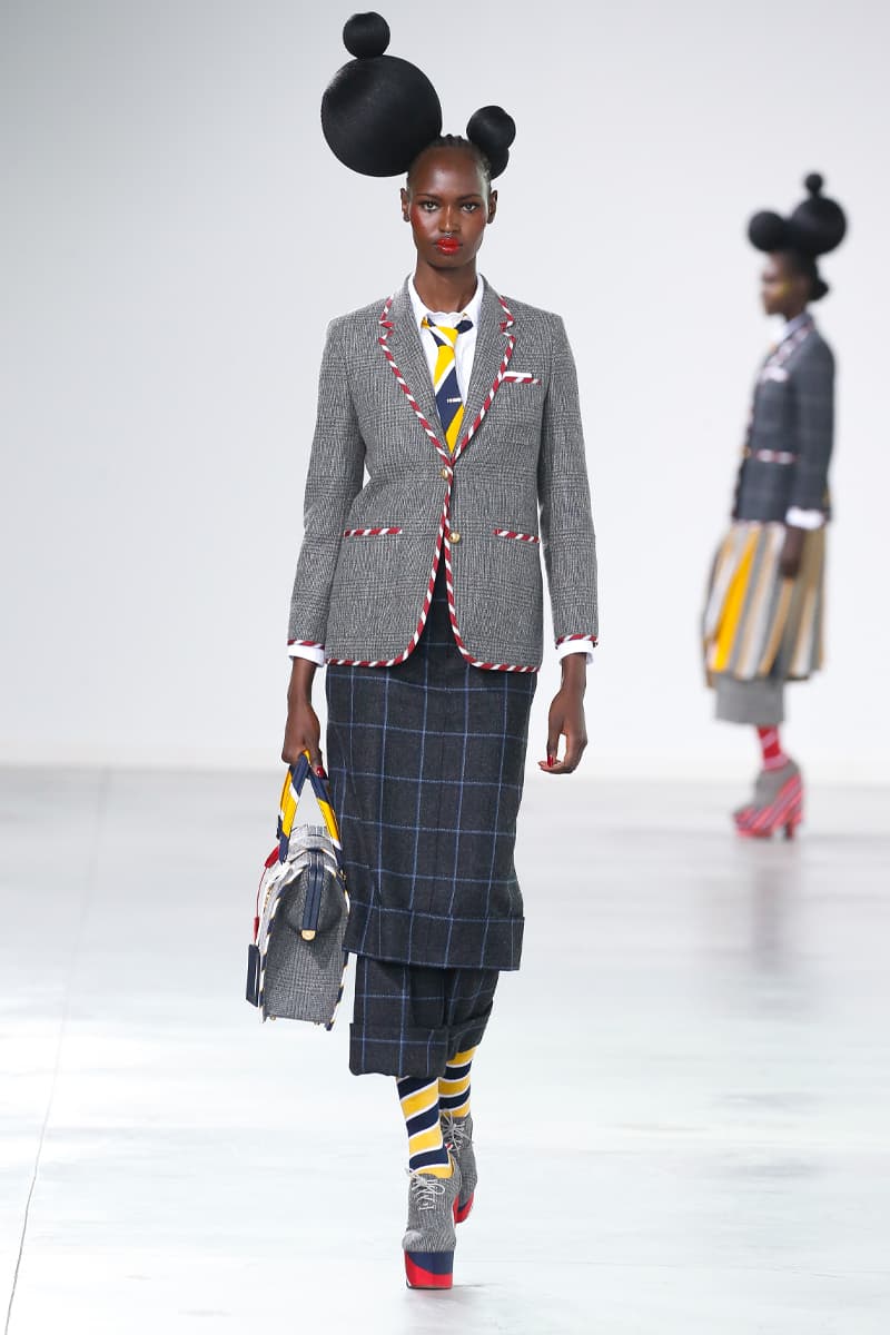 Thom Browne Brings the Drama to Classic Tailoring for Fall 2022 nyc new york city pleated skirts blazers toys chairbear adult toy shop teddybears 