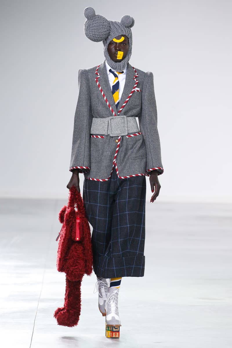 Thom Browne Brings the Drama to Classic Tailoring for Fall 2022 nyc new york city pleated skirts blazers toys chairbear adult toy shop teddybears 