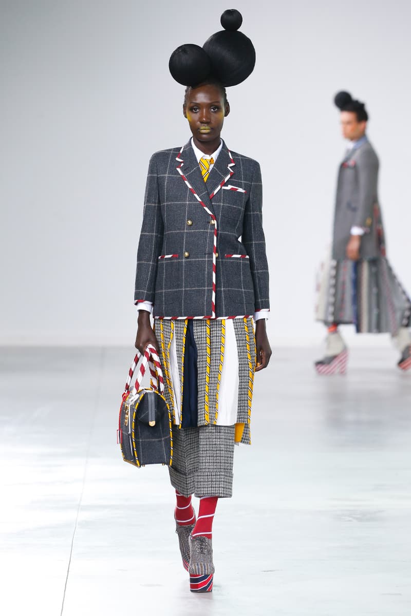 Thom Browne Brings the Drama to Classic Tailoring for Fall 2022 nyc new york city pleated skirts blazers toys chairbear adult toy shop teddybears 