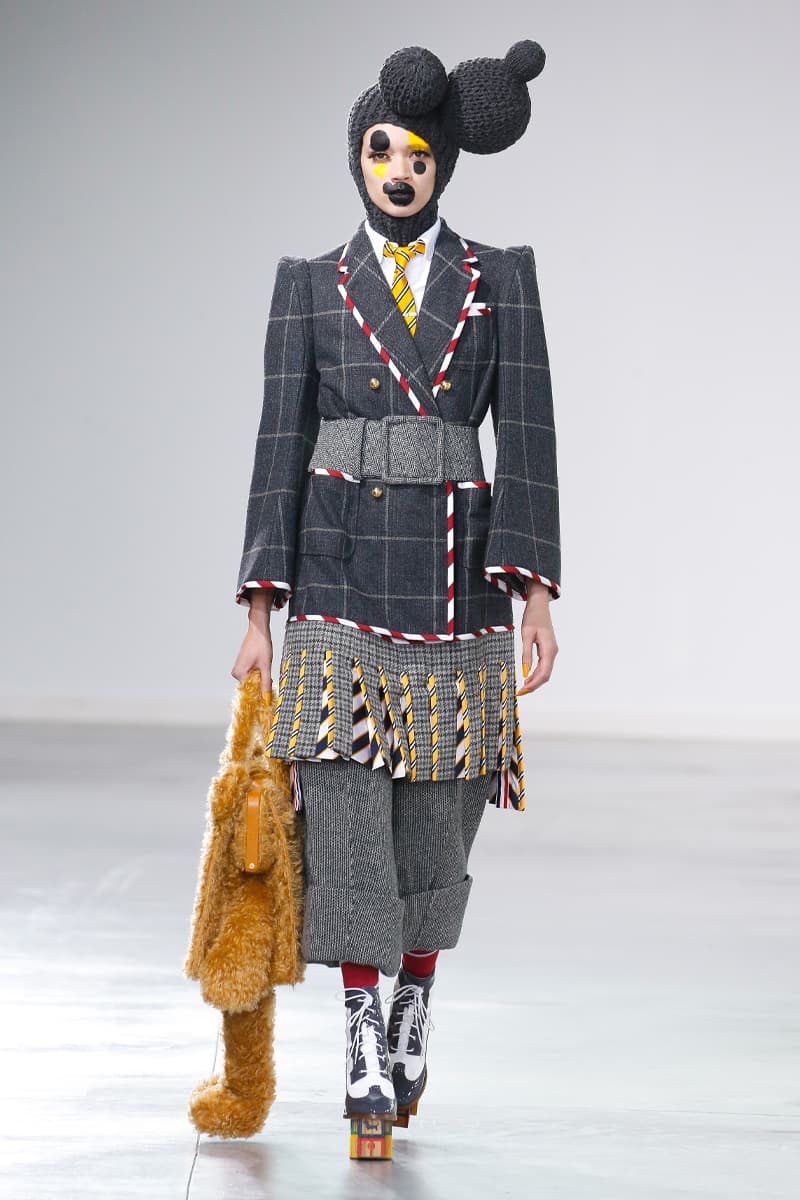 Thom Browne Brings the Drama to Classic Tailoring for Fall 2022 nyc new york city pleated skirts blazers toys chairbear adult toy shop teddybears 