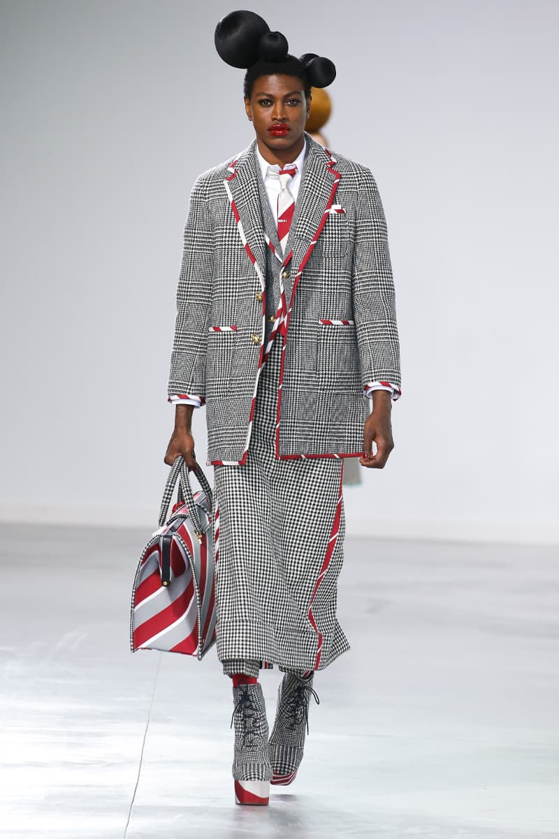 Thom Browne Brings the Drama to Classic Tailoring for Fall 2022 nyc new york city pleated skirts blazers toys chairbear adult toy shop teddybears 