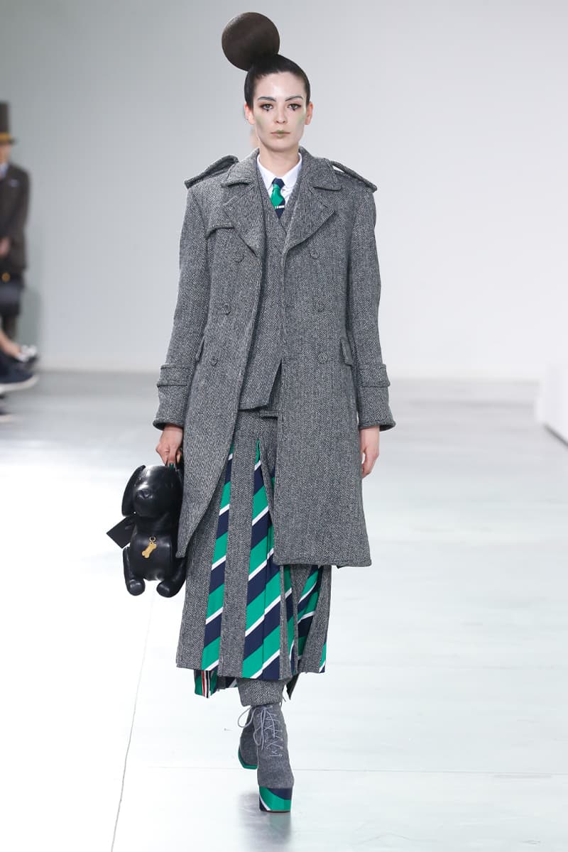 Thom Browne Brings the Drama to Classic Tailoring for Fall 2022 nyc new york city pleated skirts blazers toys chairbear adult toy shop teddybears 