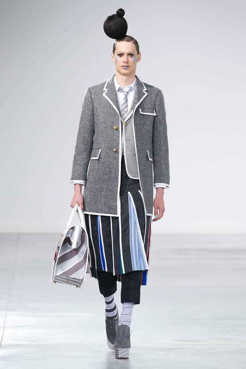 Thom Browne Brings the Drama to Classic Tailoring for Fall 2022 nyc new york city pleated skirts blazers toys chairbear adult toy shop teddybears 