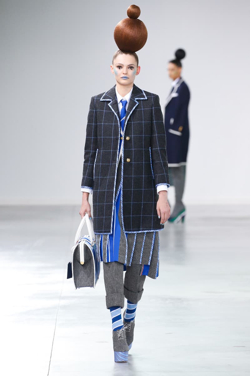 Thom Browne Brings the Drama to Classic Tailoring for Fall 2022 nyc new york city pleated skirts blazers toys chairbear adult toy shop teddybears 