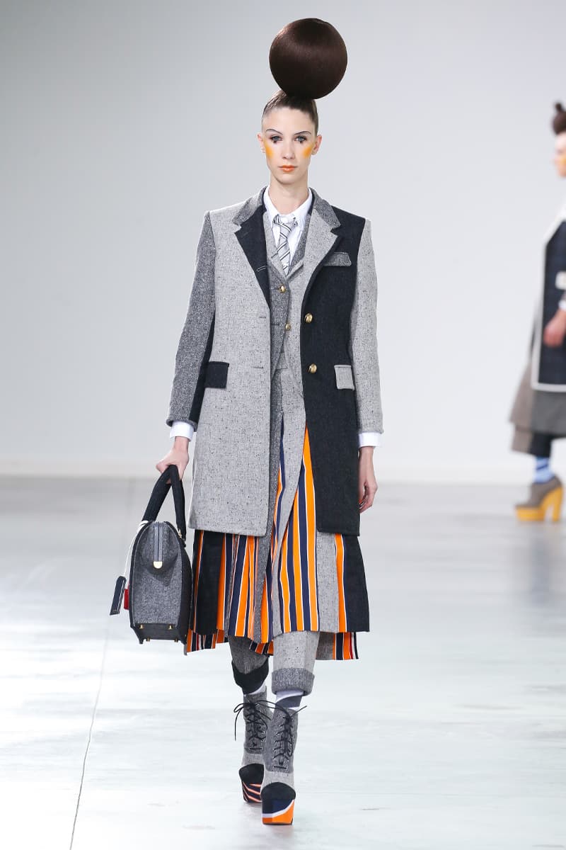 Thom Browne Brings the Drama to Classic Tailoring for Fall 2022 nyc new york city pleated skirts blazers toys chairbear adult toy shop teddybears 