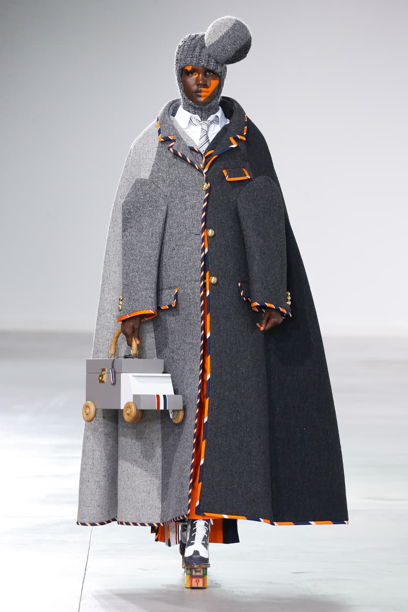 Thom Browne Brings the Drama to Classic Tailoring for Fall 2022 nyc new york city pleated skirts blazers toys chairbear adult toy shop teddybears 