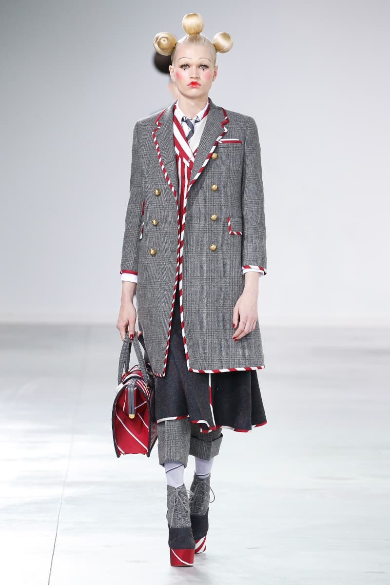 Thom Browne Brings the Drama to Classic Tailoring for Fall 2022 nyc new york city pleated skirts blazers toys chairbear adult toy shop teddybears 