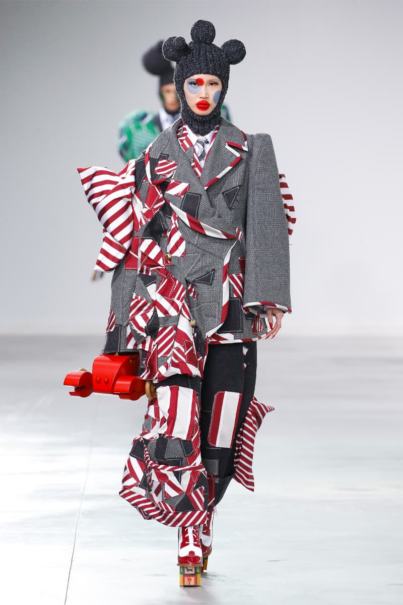 Thom Browne Brings the Drama to Classic Tailoring for Fall 2022 nyc new york city pleated skirts blazers toys chairbear adult toy shop teddybears 