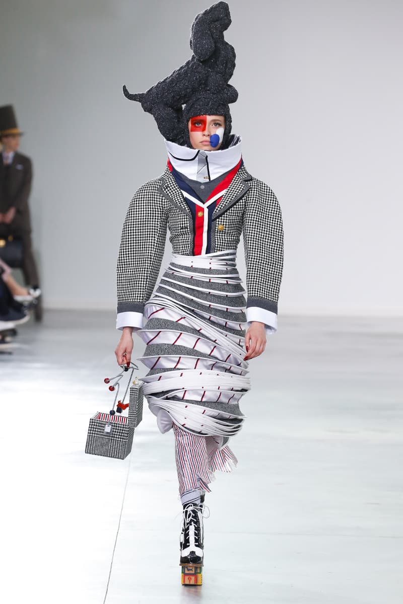 Thom Browne Brings the Drama to Classic Tailoring for Fall 2022 nyc new york city pleated skirts blazers toys chairbear adult toy shop teddybears 