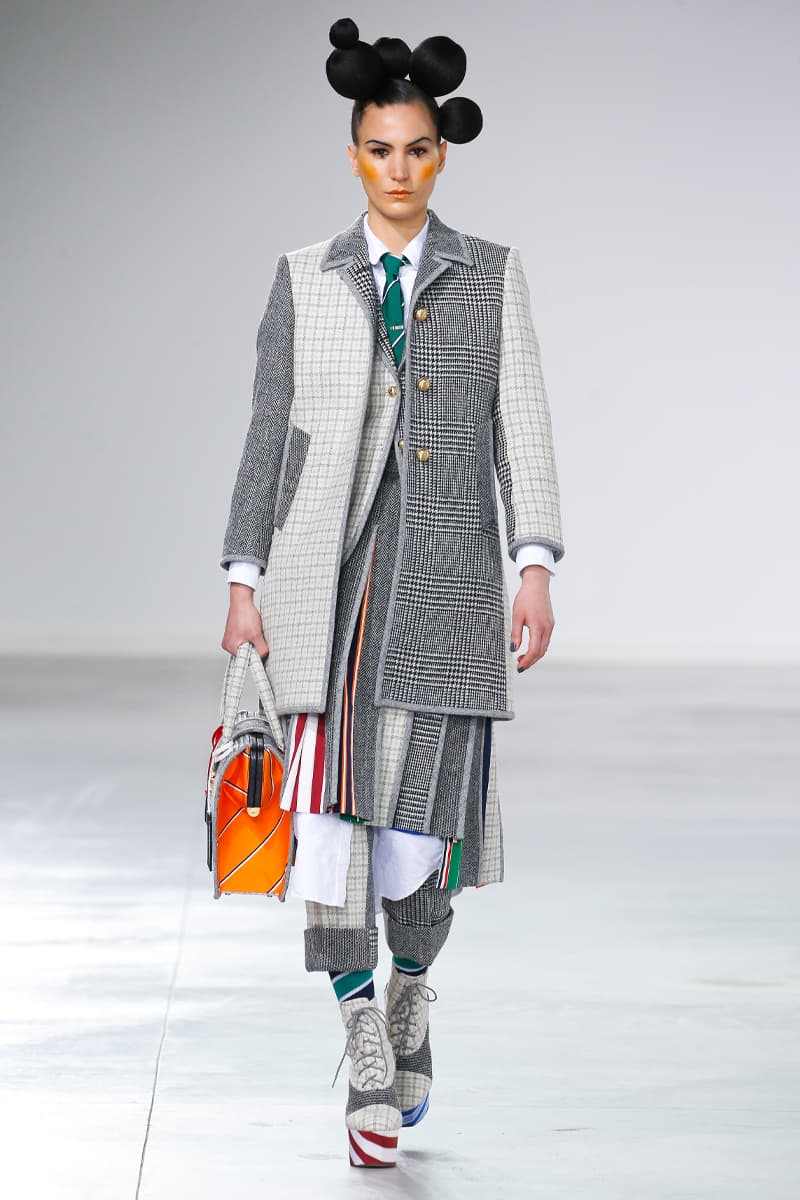 Thom Browne Brings the Drama to Classic Tailoring for Fall 2022 nyc new york city pleated skirts blazers toys chairbear adult toy shop teddybears 