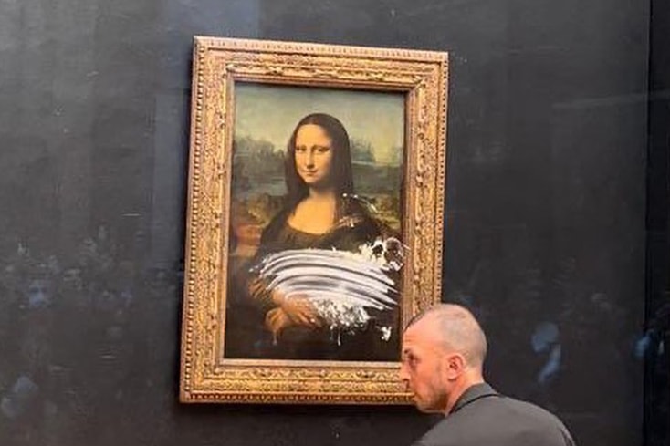 The Mona Lisa Caked By Man Disguised as Old Woman attack vandalize the louvre roses security news info 