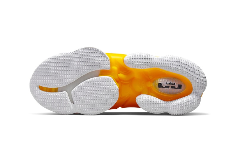 The Nike LeBron 19 Releases in a Bold New "Hard Hat" Colorway CZ0203-700 contruction bob the builder lebron james los angeles lakers gold purple yellow basketball shoes off-court black yellow