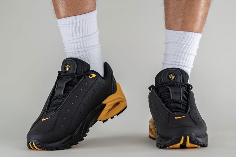 On-Foot Look at the NOCTA x Nike Hot Step Air Terra "Black/University Gold" DH4692-002 drake nike nocta purple the6ix