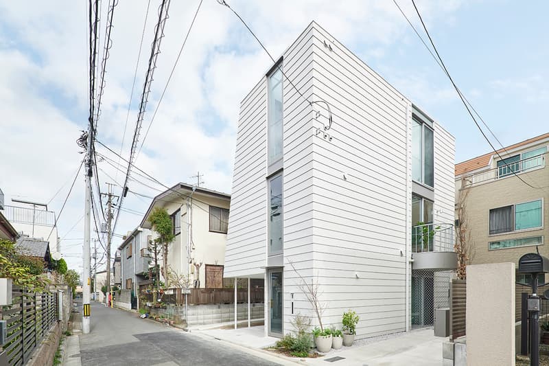 NOT Architects Studio "Scoops Up" Surrounding Scenery for Skinny Tokyo House