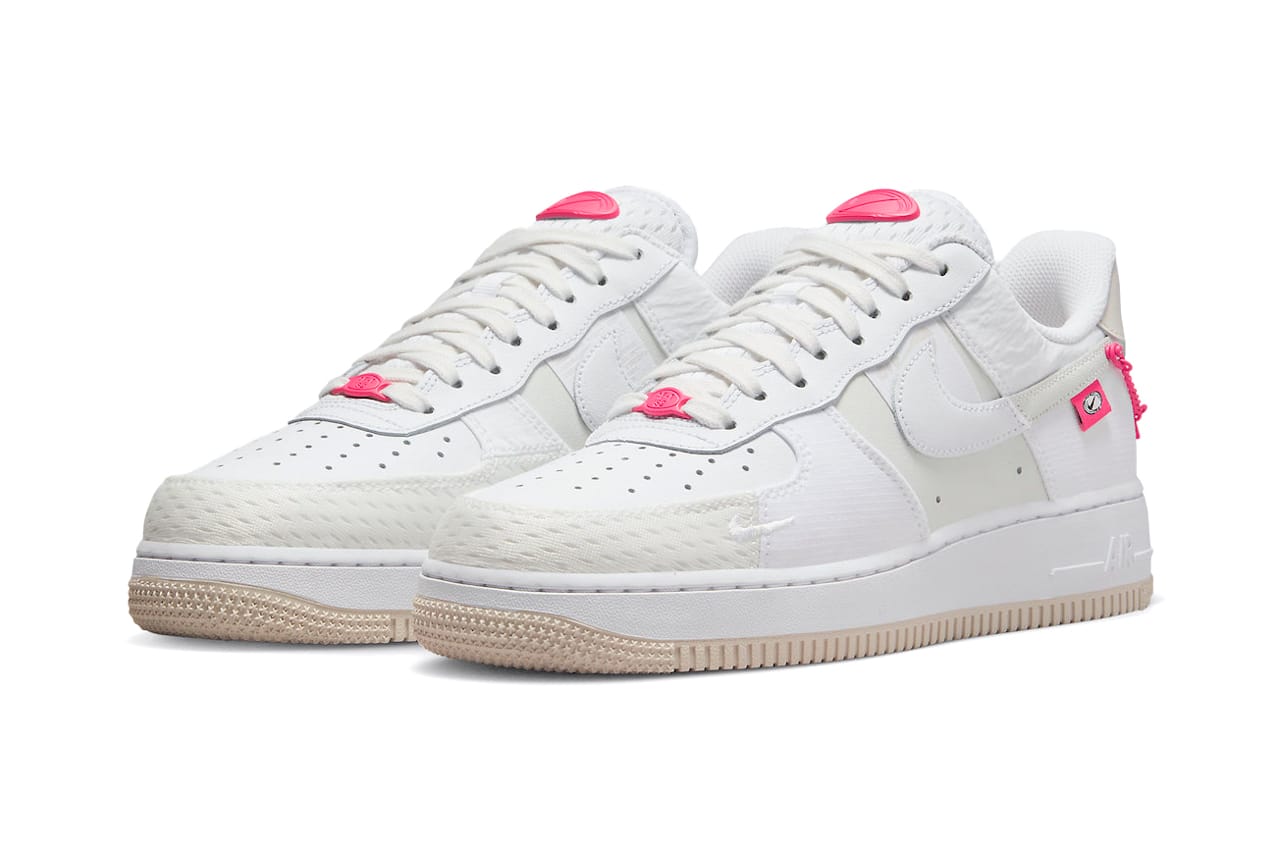 white nike air force with pink swoosh