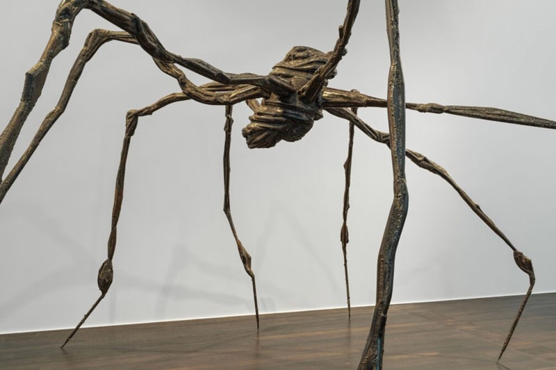 ADVANCE FOR SUNDAY APRIL 2 ** A spider sculpture hangs on the wall next to  a paragraph from artist Louise Bourgeois at the Walters Art Museum in  Baltimore Feb 9, 2006. A