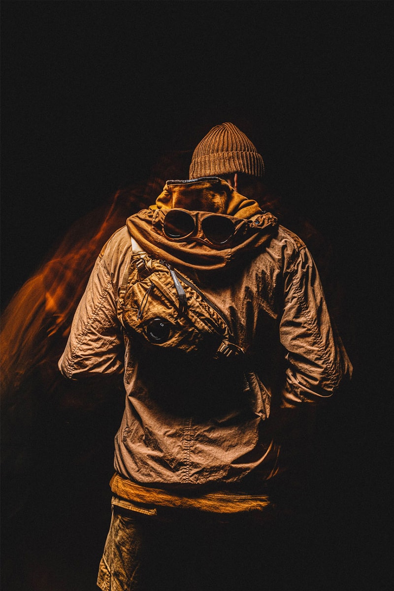 C.P. Company Fall/ Winter 2022 Collection HBX Release Info Buy Price Hooded Down Jacket Shirt Pockets Shorts Cargo Pants Fleece Nylon Crossbody Packs Shoulder Bags Rucksack Beanie Logo Caps Hoodie Brown Black Green Blue Navy