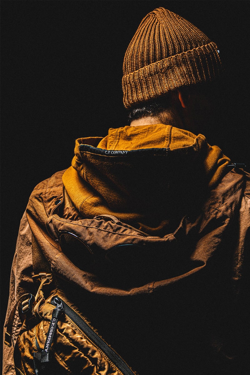 C.P. Company Fall/ Winter 2022 Collection HBX Release Info Buy Price Hooded Down Jacket Shirt Pockets Shorts Cargo Pants Fleece Nylon Crossbody Packs Shoulder Bags Rucksack Beanie Logo Caps Hoodie Brown Black Green Blue Navy