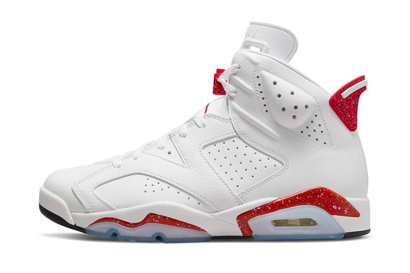 all white jordans with red