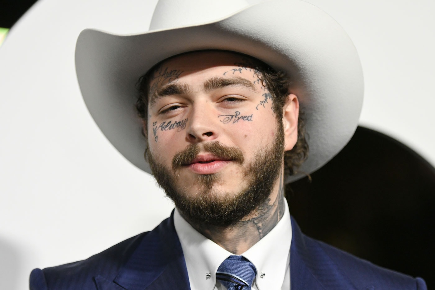 Post Malone's 'Twelve Carat Toothache' Album Is on Track To Earning the Top Spot on Billboard 200 first week projections album stoney hollywood's bleeding gunna doja cat roddy ricch the weeknd the kid laroi 