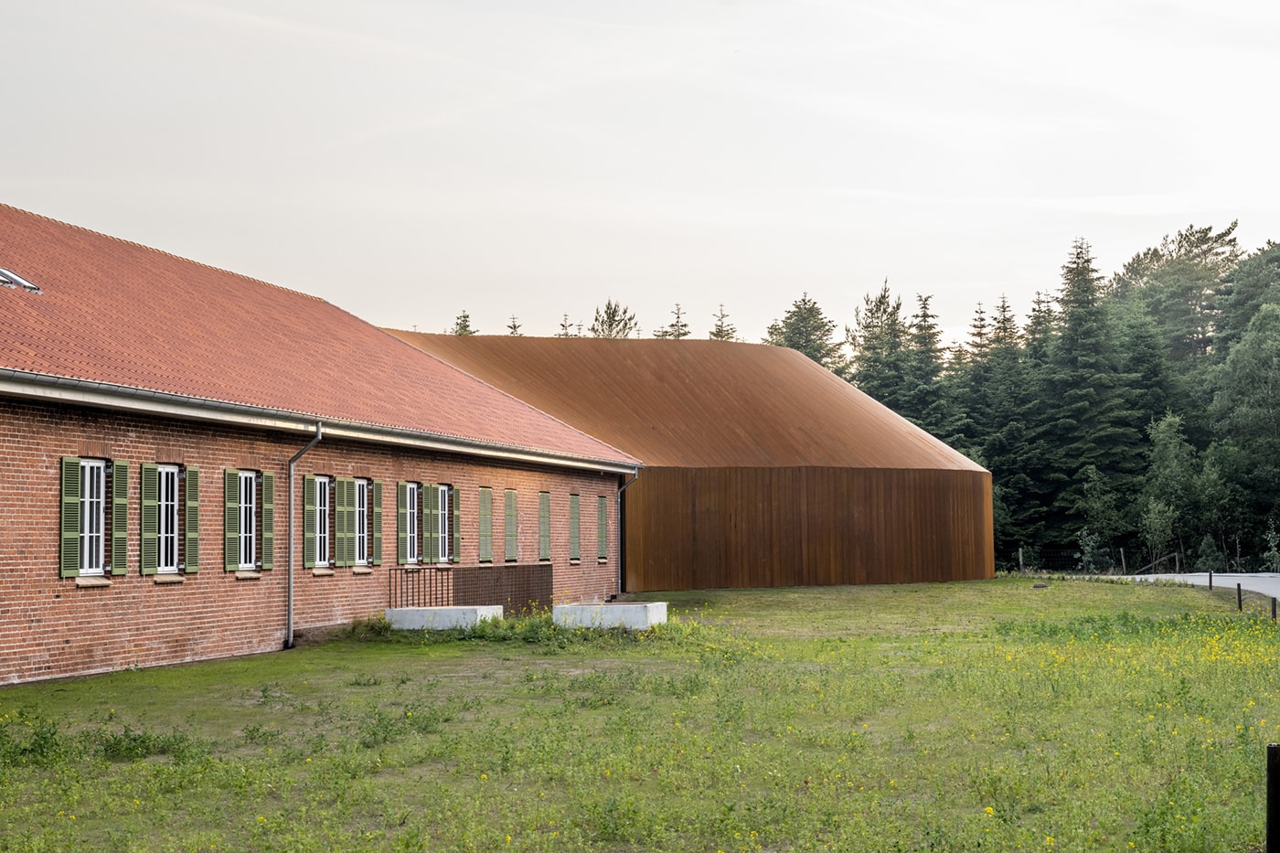 BIG Combines Corten Steel and Red Brick for Danish Refugee Museum 