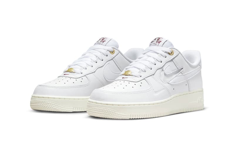 Nike Air Force 1 Low Celebrates 40 Years by Paying Homage to History of Logos Homage white cream staple af1 shoes silhouette