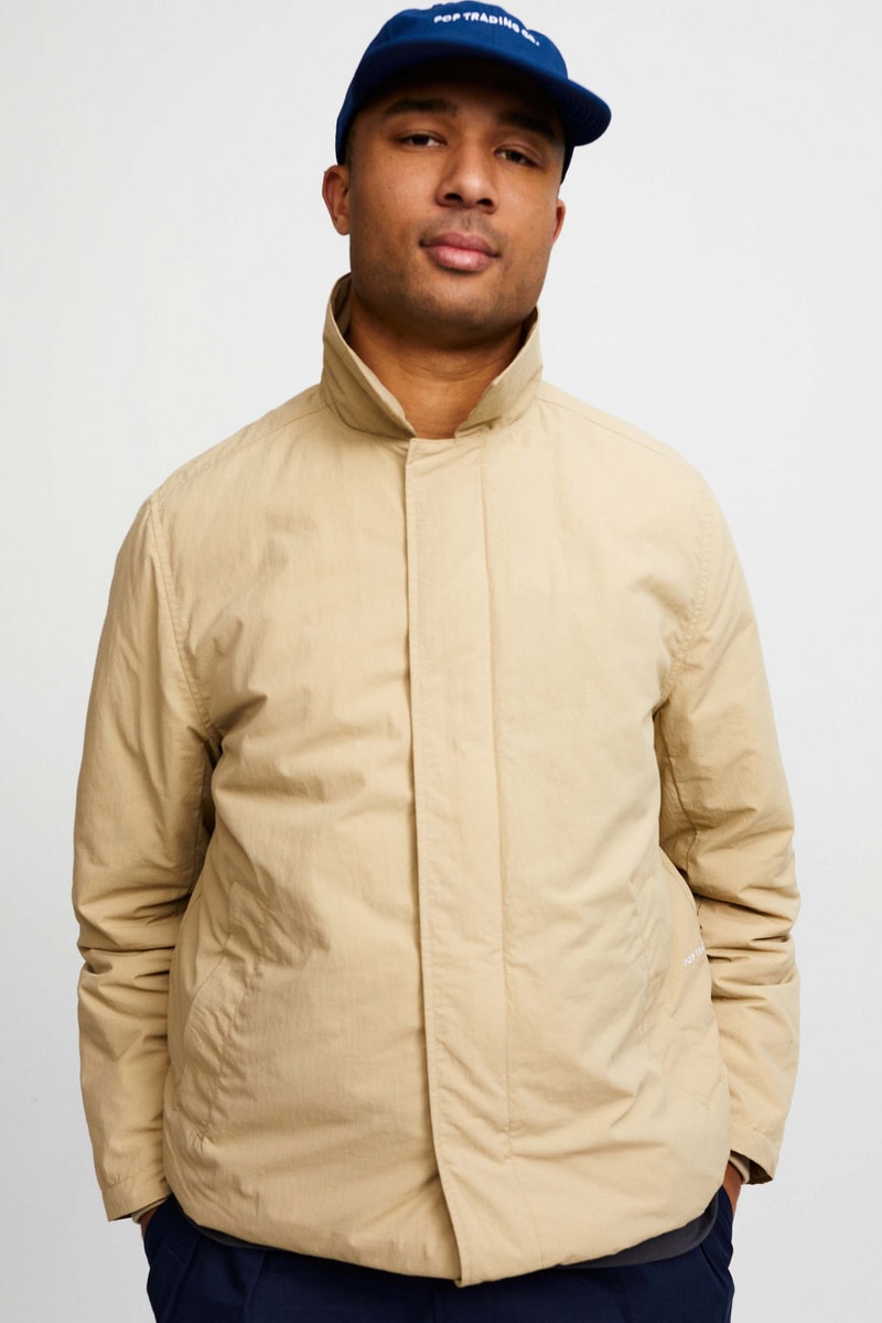 Pop Trading Company Debuts AW22 Collection tshirts jackets vests long sleeves pants hats white blue yellow orange grey black tan